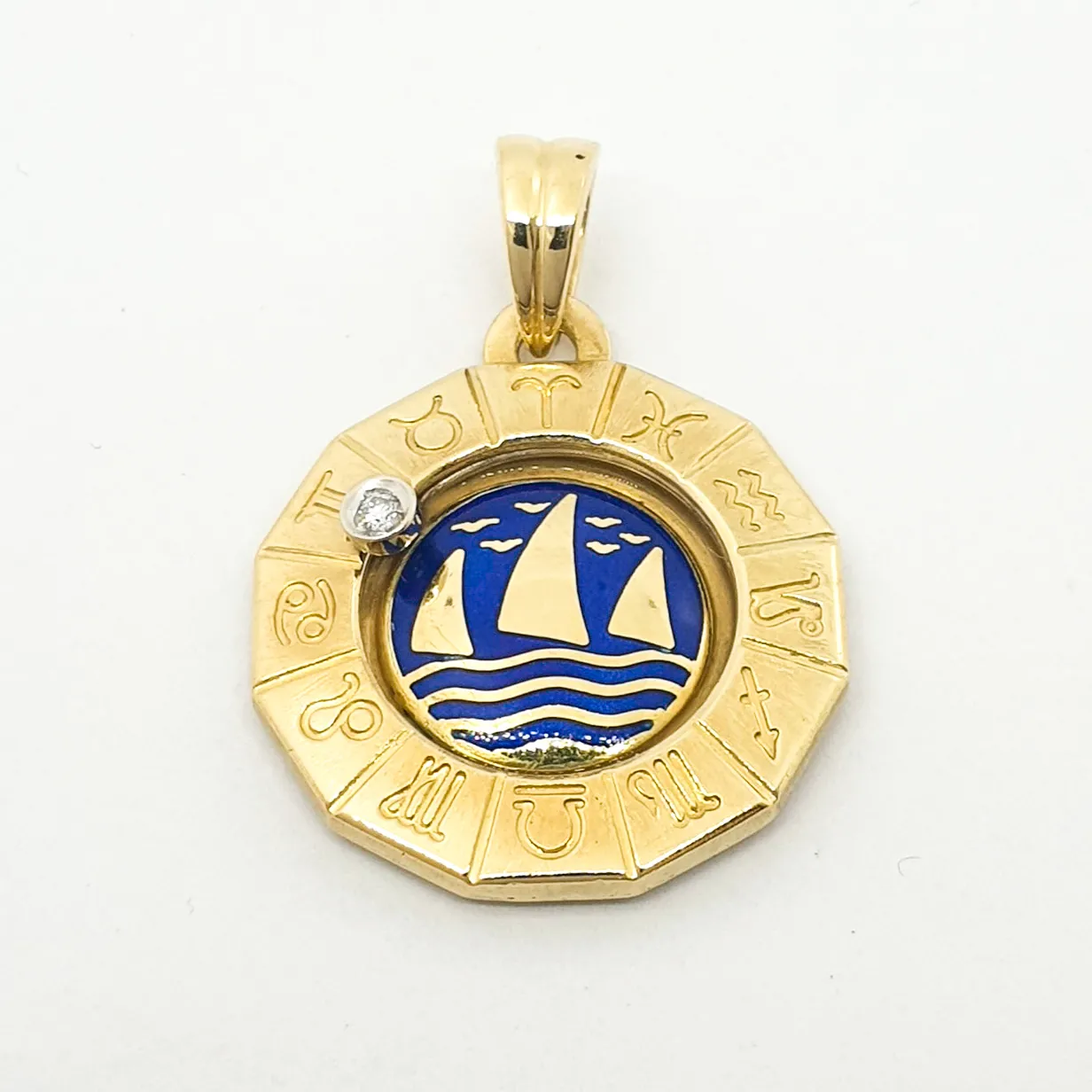 Pendaglio oro giallo 18 kt 750 segni zodiacali diamante 0,03 ct -87/vv-